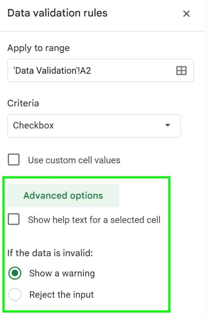 An example of choosing to show a warning or reject the input when inserting a checkbox with data validation in Google Sheets